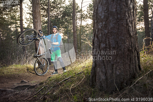 Image of Offroad Mountain biker proud of his bike