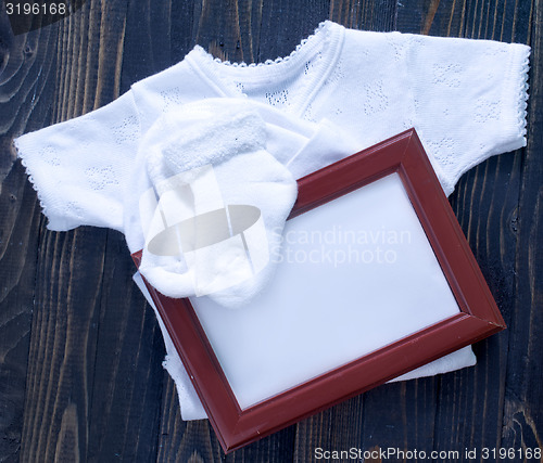 Image of baby clothes on a table