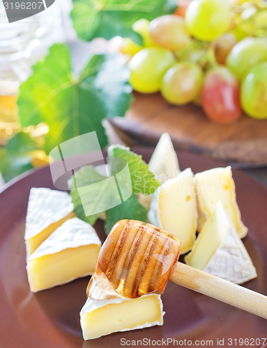 Image of cheese with grape