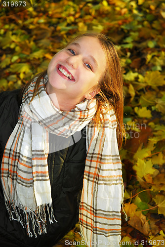 Image of Girl in a fall park