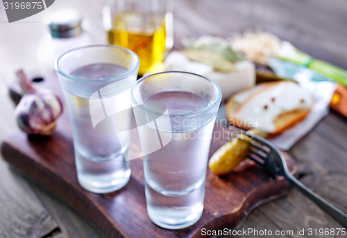 Image of vodka, lard and cucumbers