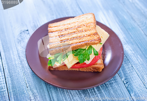 Image of toasts with cheese and tomato