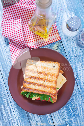 Image of toasts with cheese and tomato
