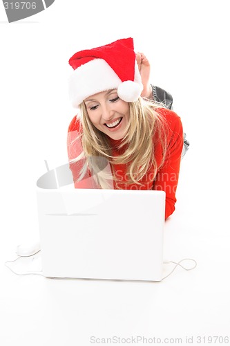 Image of Christmas girl shopping browsing internet