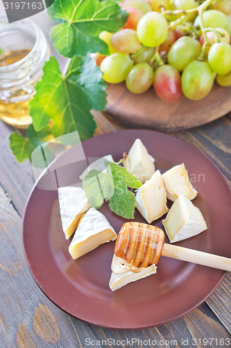 Image of cheese with grape