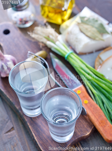 Image of vodka, lard and cucumbers