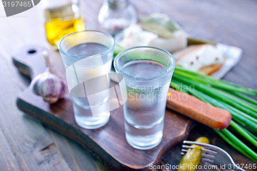 Image of vodka, lard and cucumbers