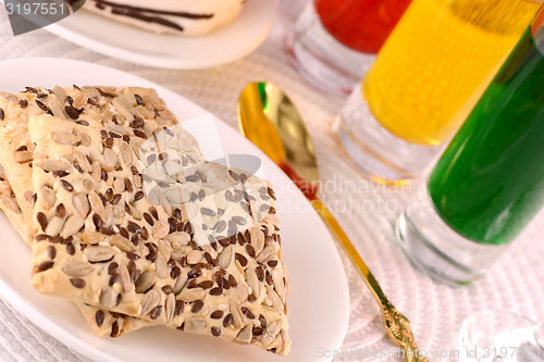 Image of sweet cake on white plate and juice