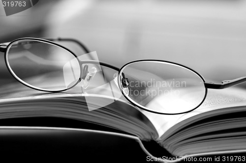 Image of Black and White - Glasses and the Magazine