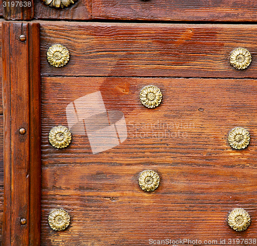 Image of abstract  rusty brass brown knocker door crenna gallarate  italy