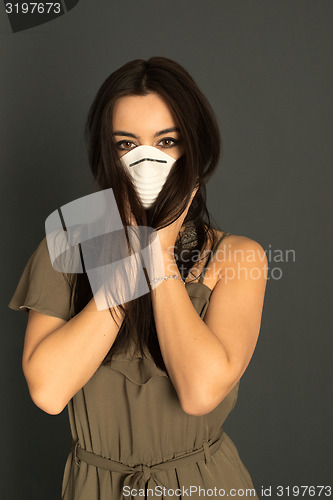 Image of Attractive woman with protective mask