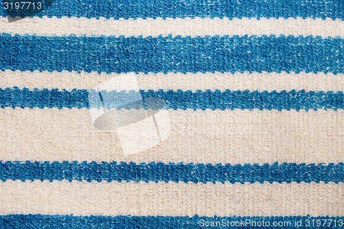 Image of Towel with blue horizontal stripes. macro