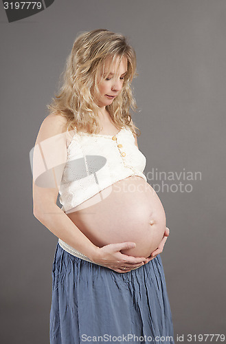 Image of blonde pregnant woman