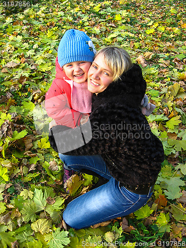 Image of Happy and smiling mother and her child