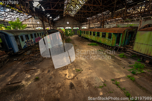 Image of Cargo trains in old train depot