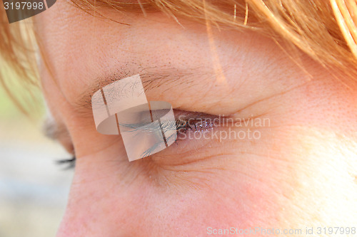 Image of face of blue-eyed sympathetic girl