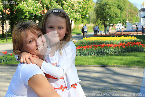 Image of mother and daughter embrace