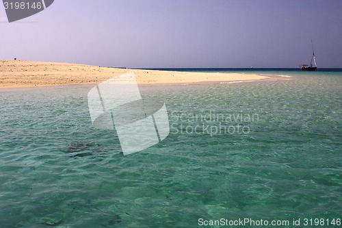 Image of beach and boat in sand bank