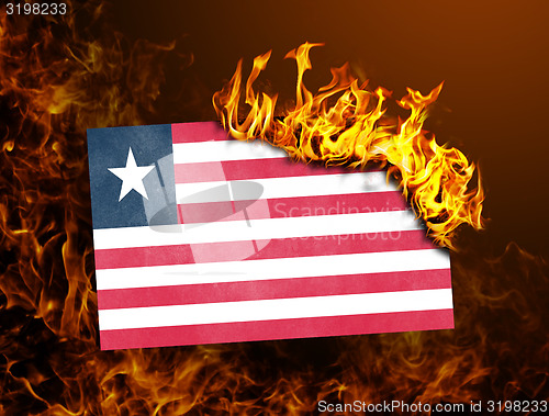 Image of Flag burning - Liberia