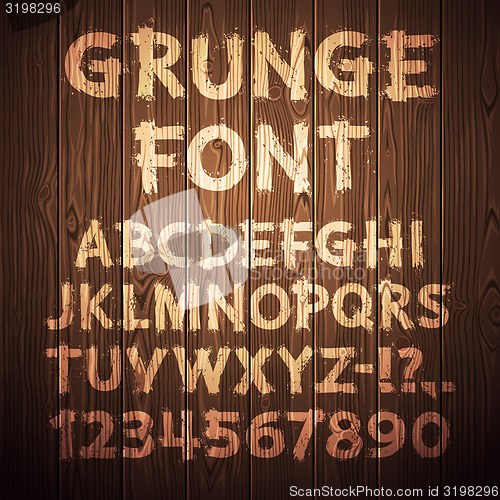Image of Grunge Letters and Numbers on Wooden Background