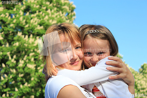 Image of mother and daughter embrace