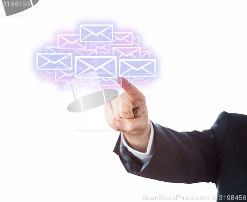 Image of Arm Aiming At Many Email Icons Forming A Cloud