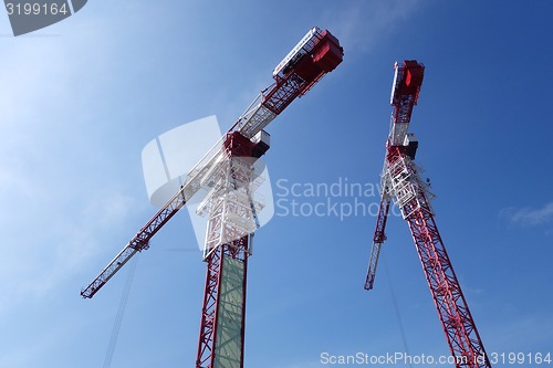 Image of Building crane and building under construction