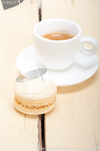 Image of colorful macaroons with espresso coffee 