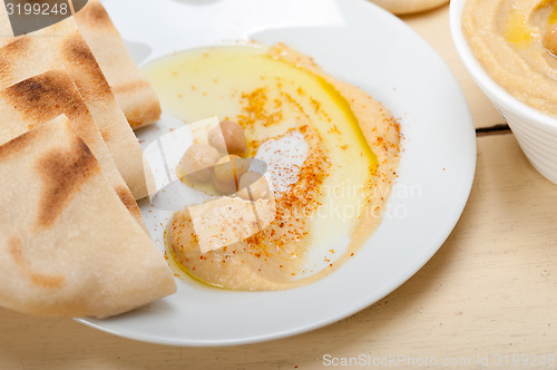 Image of Hummus with pita bread 