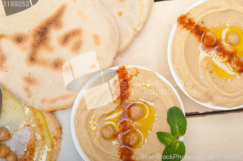 Image of Hummus with pita bread 