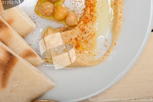 Image of Hummus with pita bread 