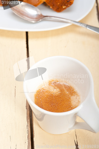 Image of plum cake and espresso coffee 