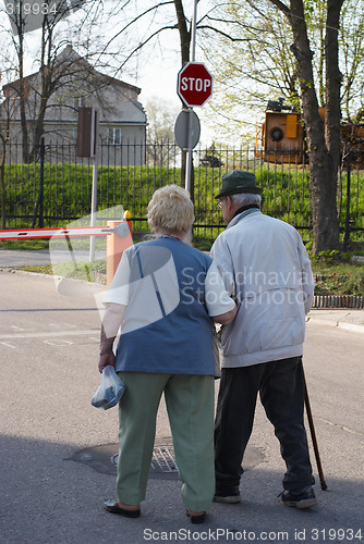 Image of Senior couple walking together