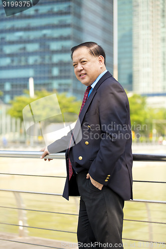 Image of Asian businessman smiling portrait