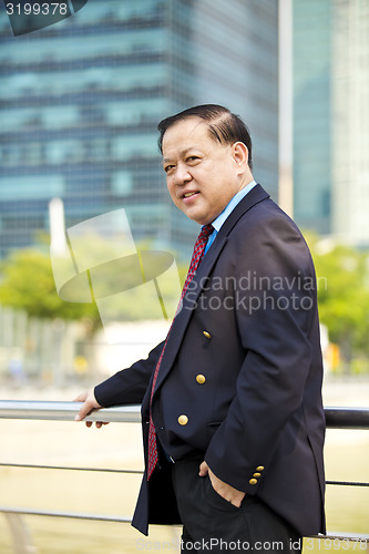 Image of Asian businessman smiling portrait