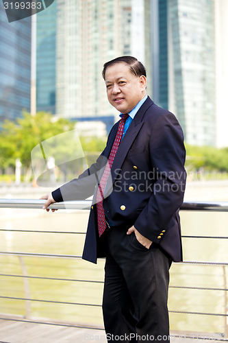 Image of Asian businessman smiling portrait