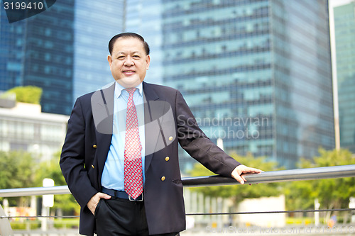 Image of Asian businessman smiling portrait