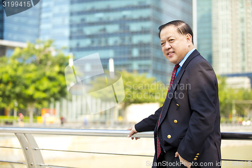 Image of Asian businessman smiling portrait