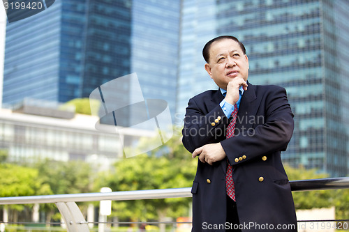 Image of Asian businessman smiling portrait