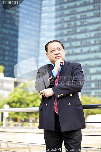 Image of Asian businessman smiling portrait