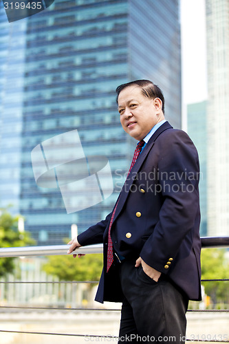 Image of Asian businessman smiling portrait