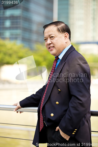 Image of Asian businessman smiling portrait