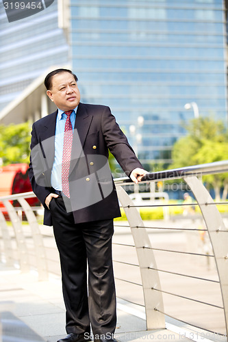 Image of Asian businessman smiling portrait