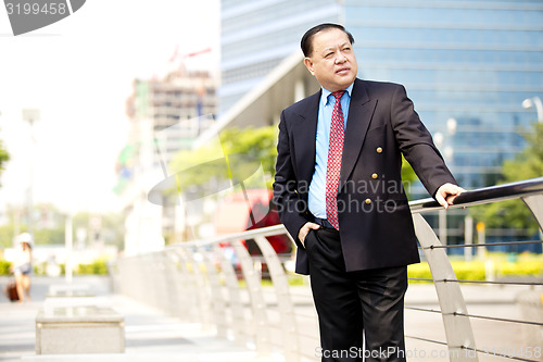 Image of Asian businessman smiling portrait