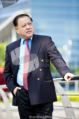 Image of Asian businessman smiling portrait