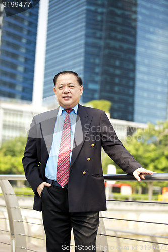 Image of Asian businessman smiling portrait