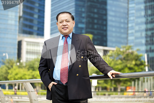 Image of Asian businessman smiling portrait