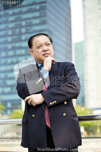 Image of Asian businessman smiling portrait