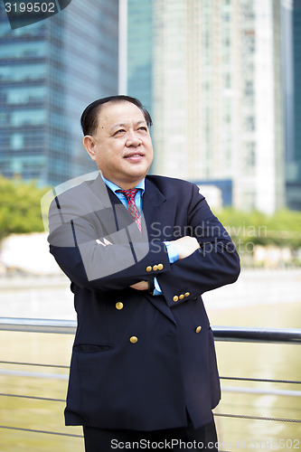 Image of Asian businessman smiling portrait