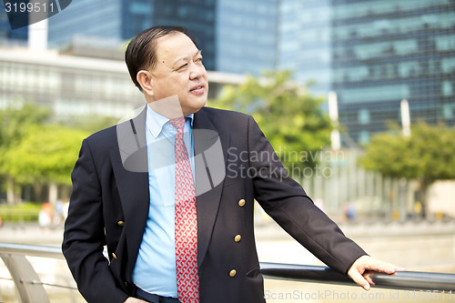 Image of Asian businessman smiling portrait